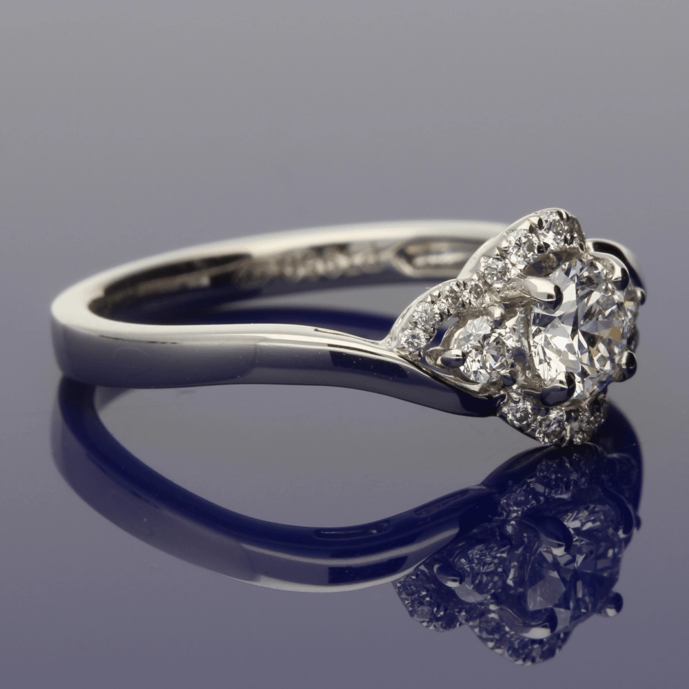 Platinum Diamond Trilogy Twist Halo Ring