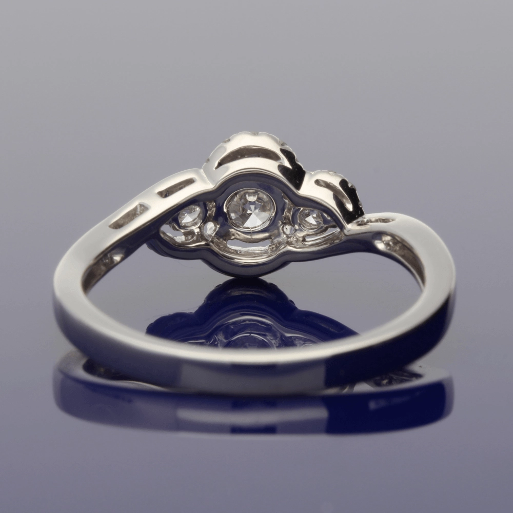 Platinum Diamond Trilogy Twist Halo Ring