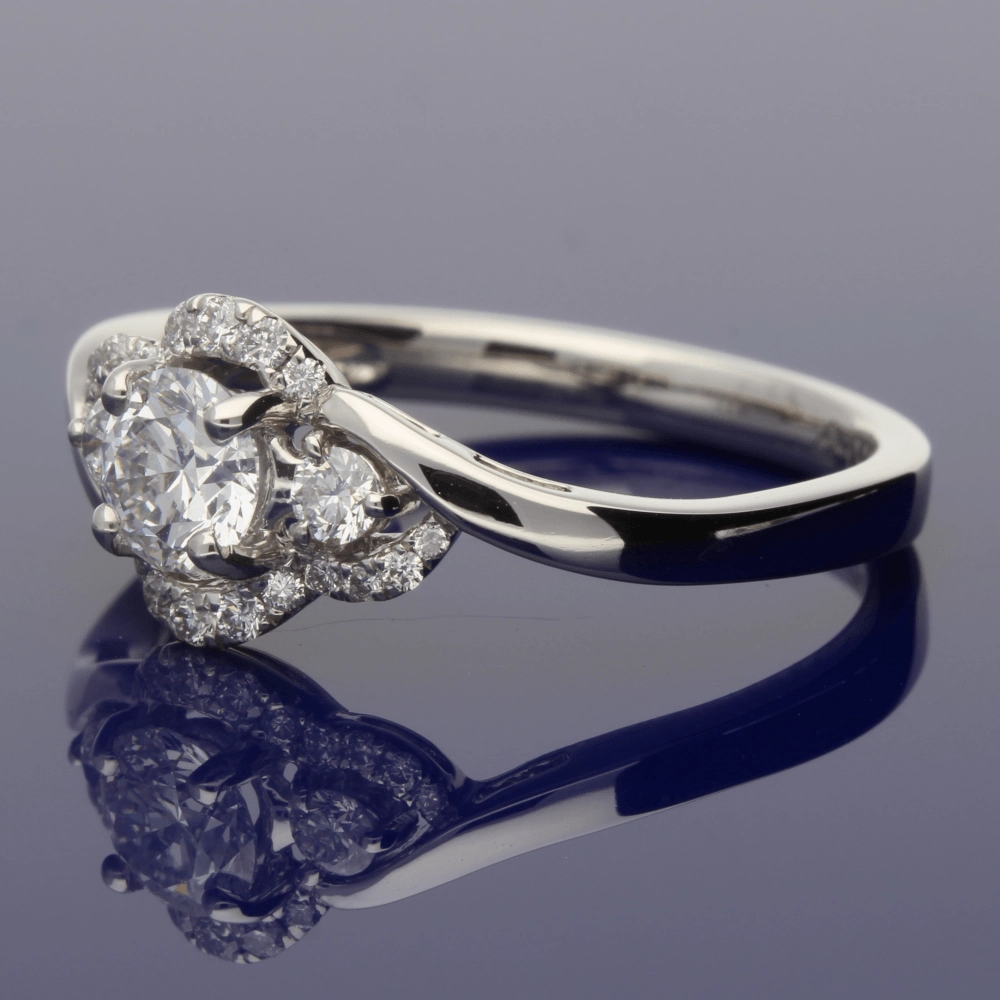Platinum Diamond Trilogy Twist Halo Ring