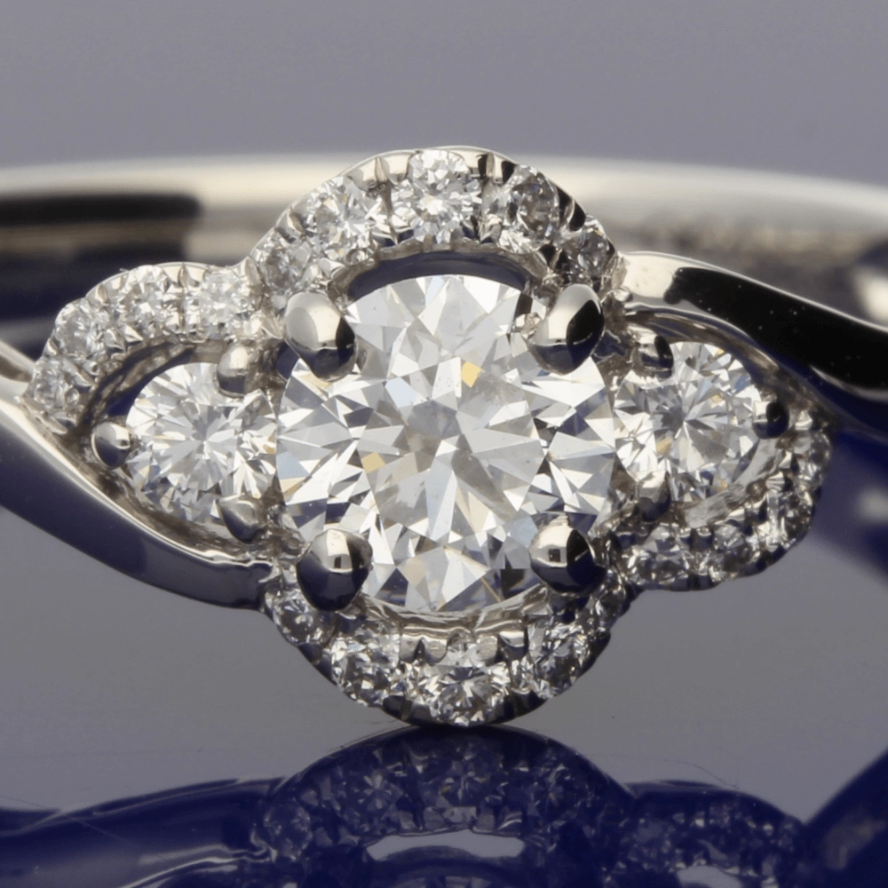 Platinum Diamond Trilogy Twist Halo Ring