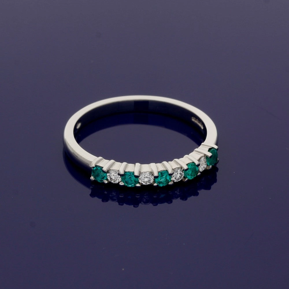 Platinum Emerald & Diamond 7 Stone Ring