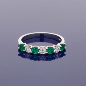 Platinum Emerald and Diamond 7 Stone Ring