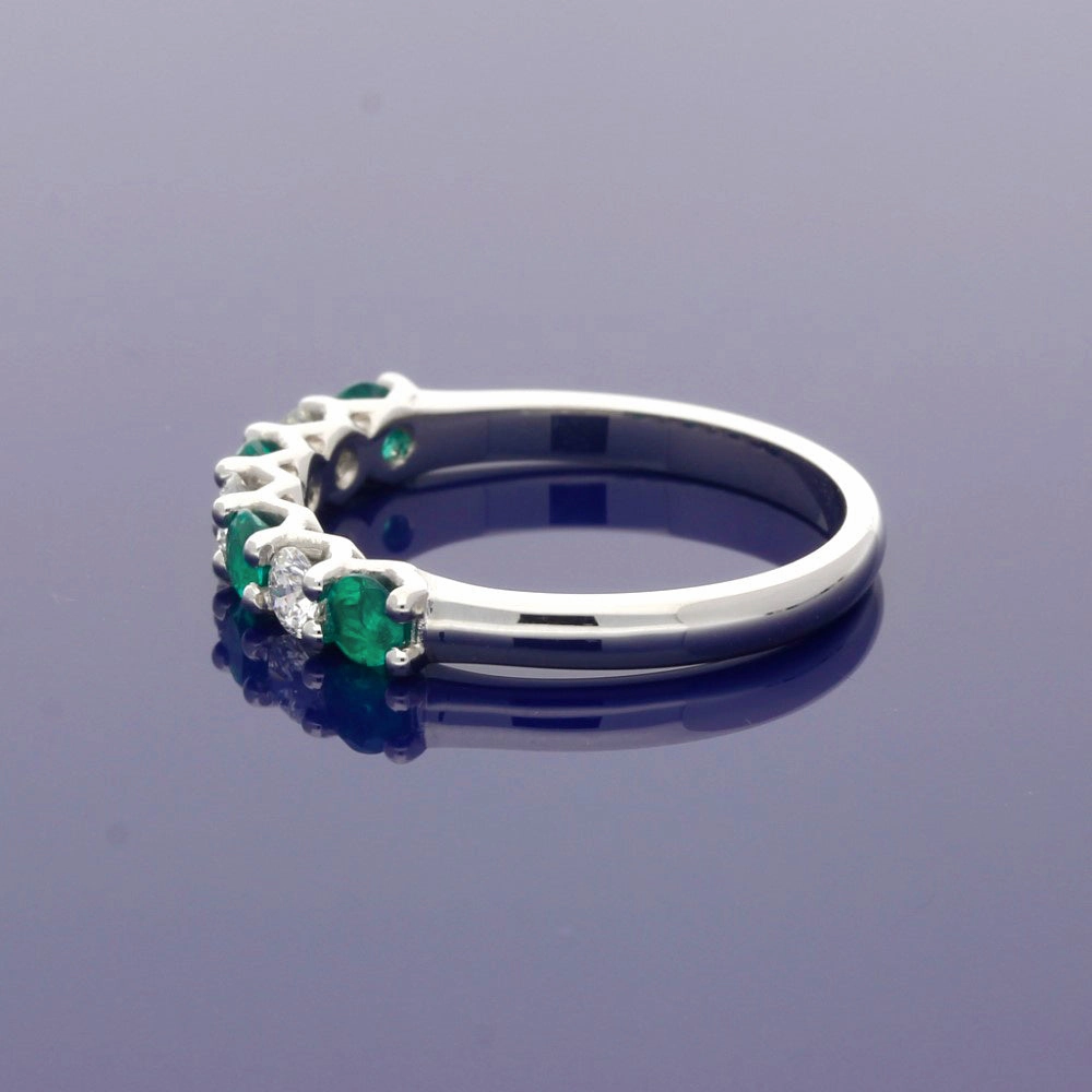 Platinum Emerald and Diamond 7 Stone Ring