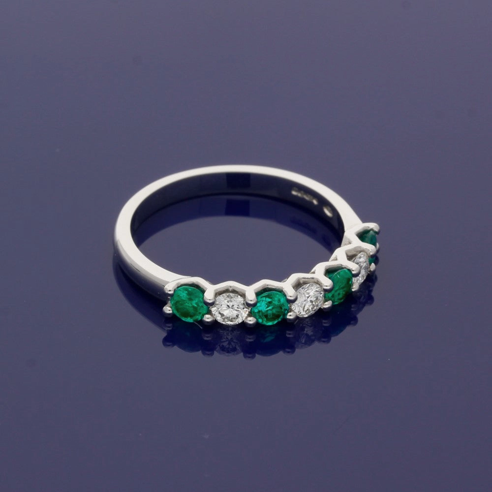 Platinum Emerald and Diamond 7 Stone Ring