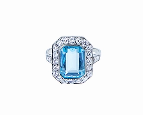 Platinum ring with blue topaz and diamonds