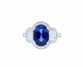 Platinum ring with diamonds and sapphire