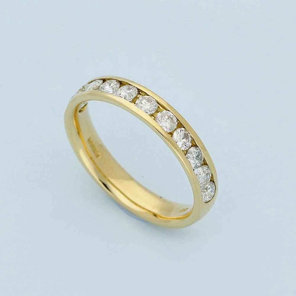 Pre-loved 18ct Yellow Gold Channel Set Diamond Half Eternity Ring
