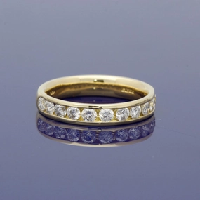Pre-loved 18ct Yellow Gold Channel Set Diamond Half Eternity Ring