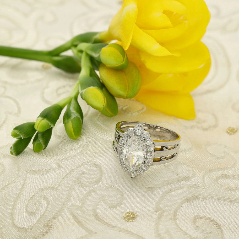 Pre-loved Vintage Platinum Marquise & Old Cut Diamond Halo Ring