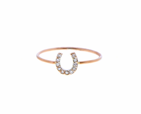 Rose gold ring with a diamond horseshoe