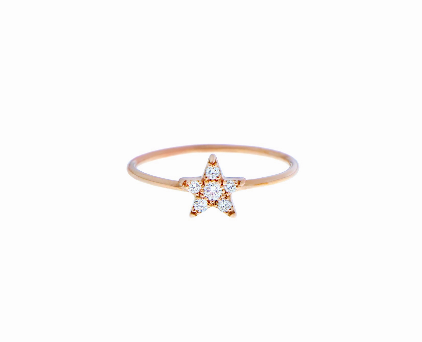 Rose gold ring with a diamond star