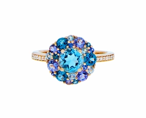 Rose gold ring with blue topaz, iolite and diamonds