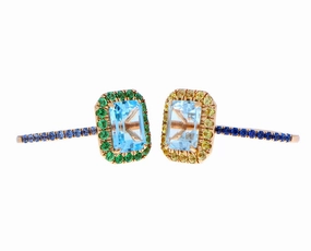 Rose gold ring with blue topaz, tsavorite, sapphires and aquamarines