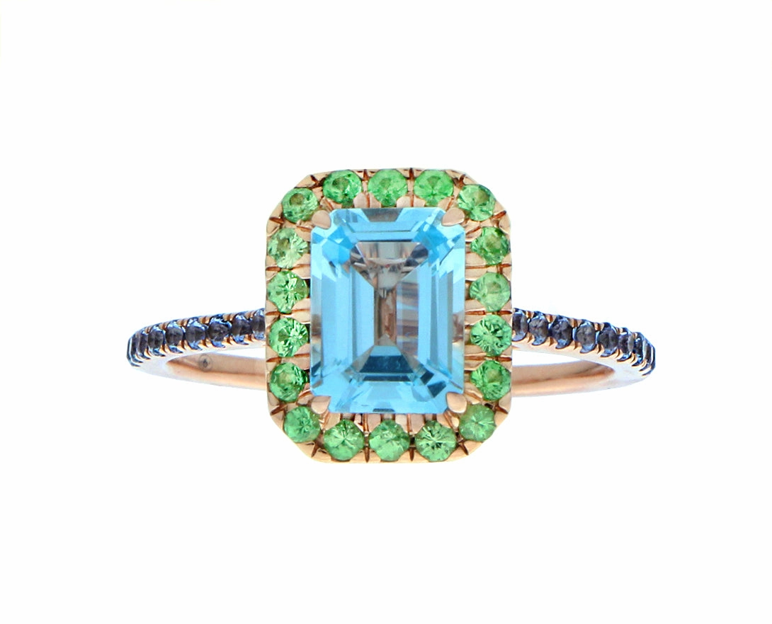 Rose gold ring with blue topaz, tsavorite, sapphires and aquamarines