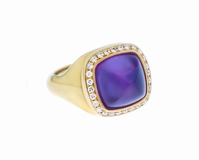 Rose gold ring with diamonds and an amethyst