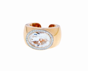 Rose gold ring with diamonds and topaz