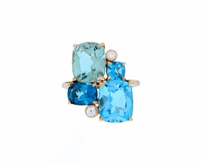 Rose gold ring with diamonds, blue topaz and green quartz
