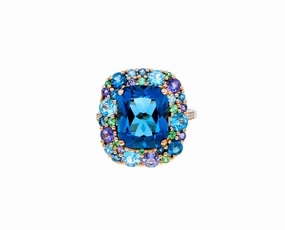 Rose gold ring with London blue topaz, blue topaz, iolite, tsavorite and diamonds