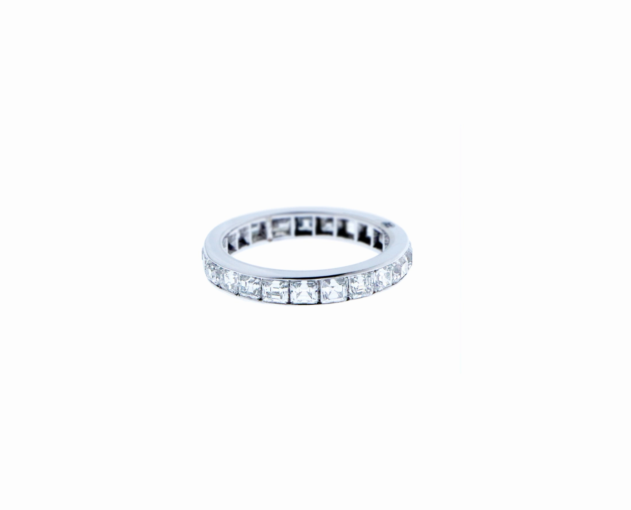 White gold alliance ring with square cut diamonds