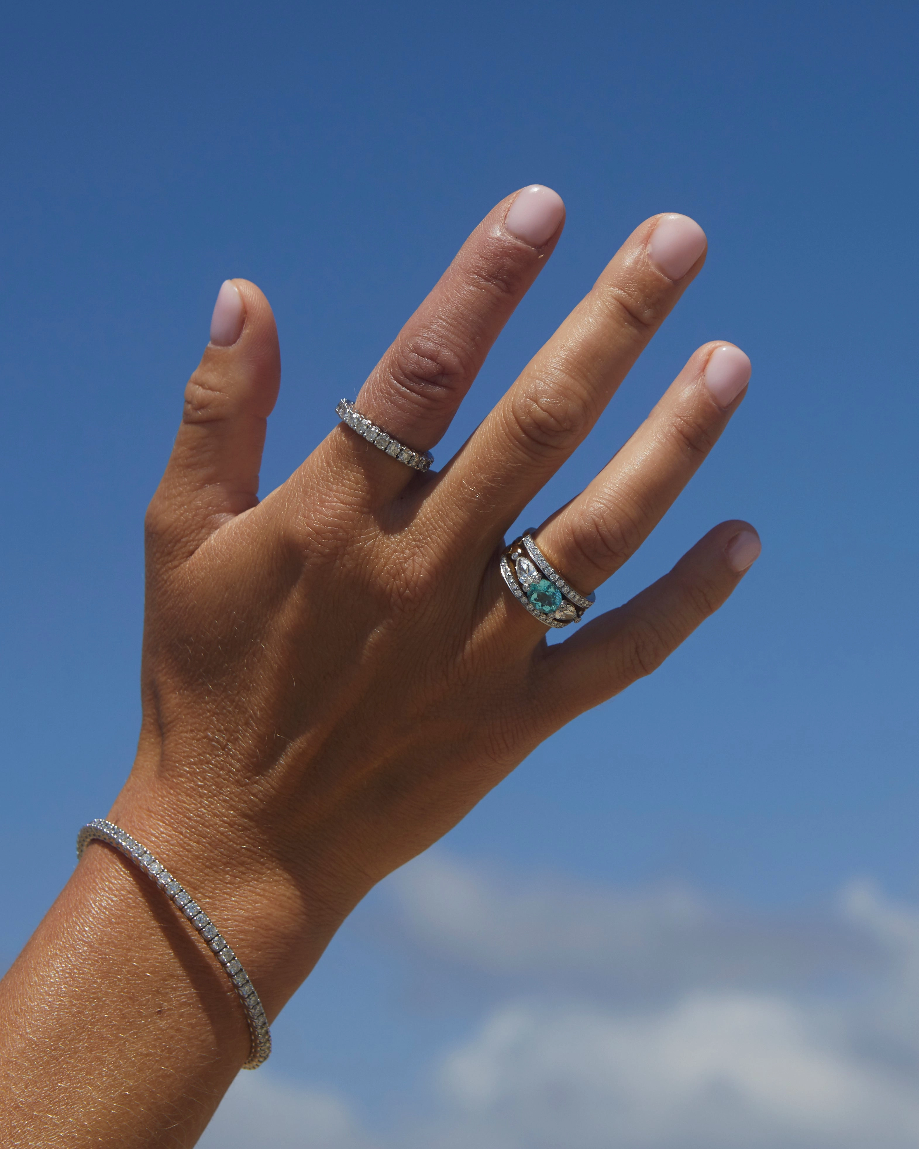 White gold and diamond ring with a paraiba tourmaline