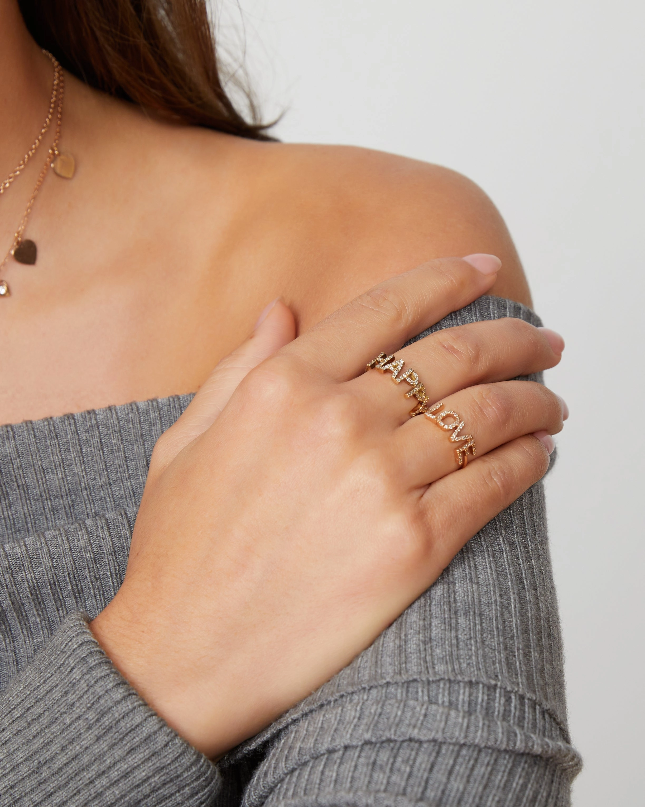 Yellow and rose gold diamond ring with letters