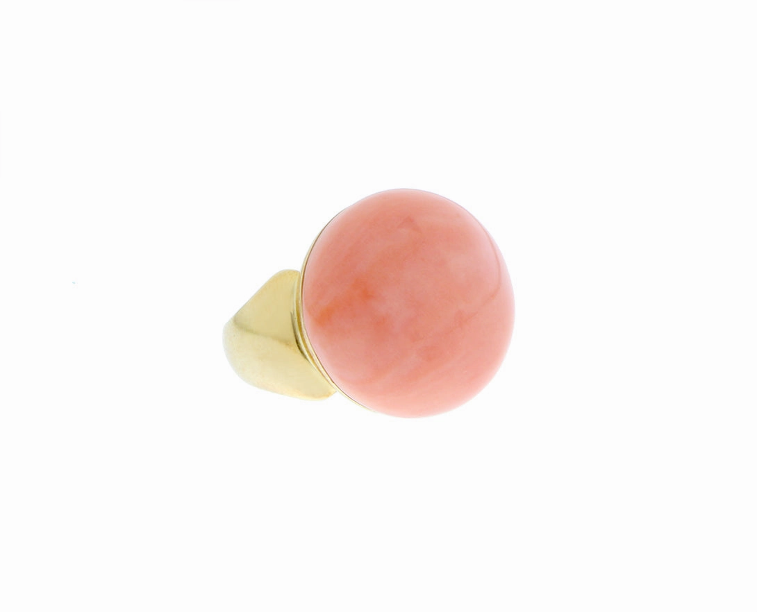 Yellow gold cabochon cut coral ring and earrings