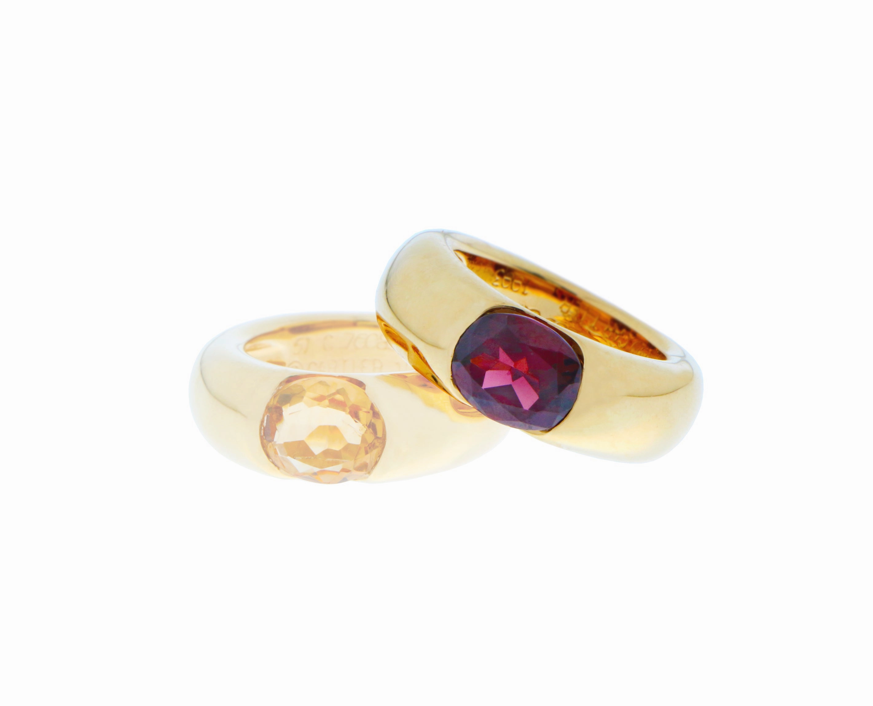 Yellow gold Cartier Ellipse ring with citrine or garnet. Price per ring