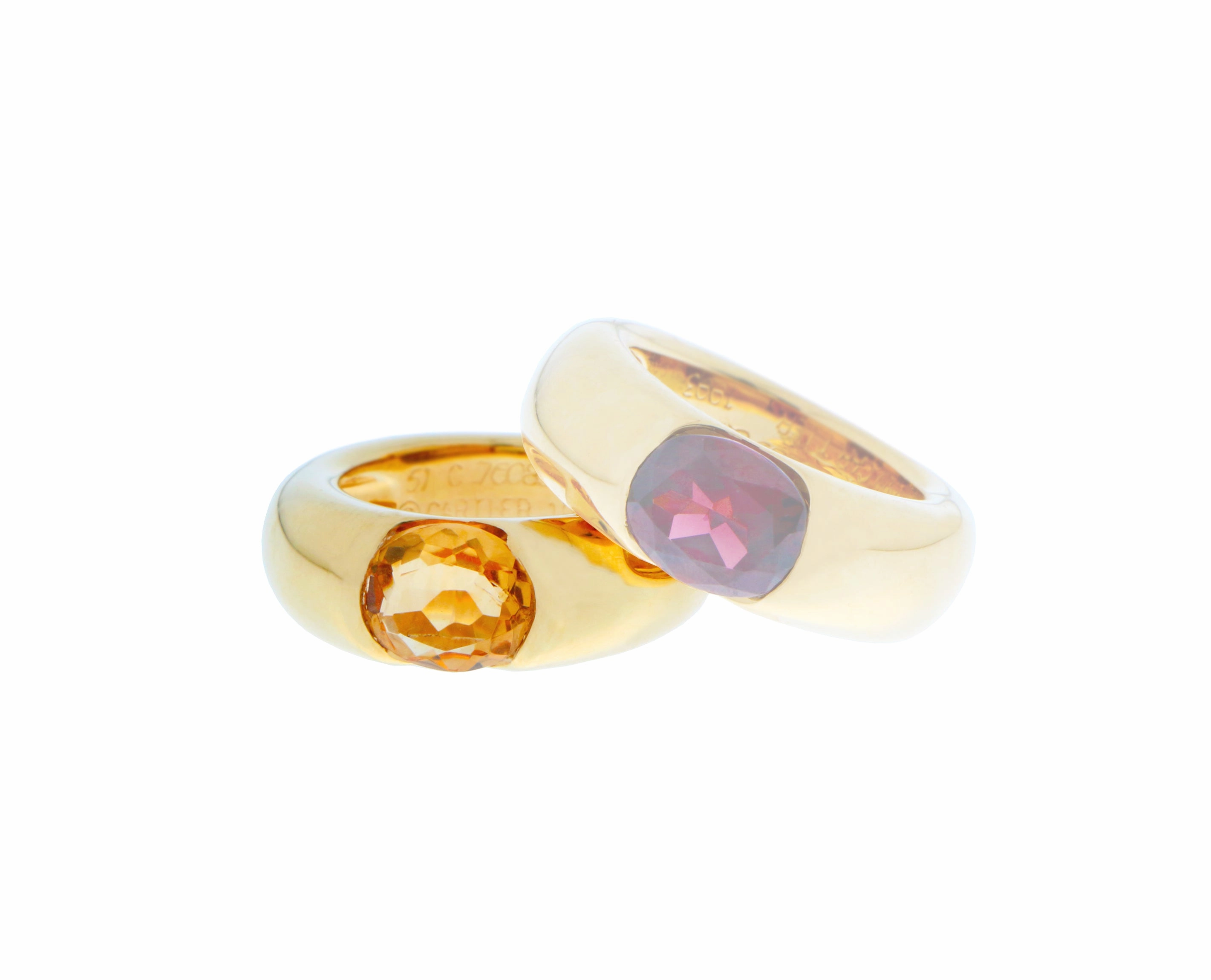 Yellow gold Cartier Ellipse ring with citrine or garnet. Price per ring