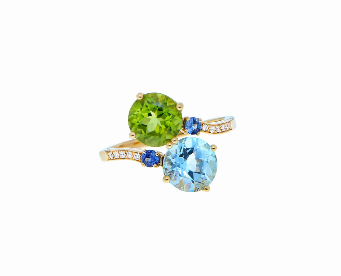 Yellow gold diamond ring with topaz, peridots and sapphires