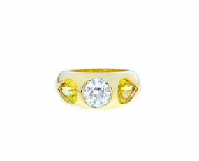 Yellow gold gypsy ring with a diamond and two yellow sapphires