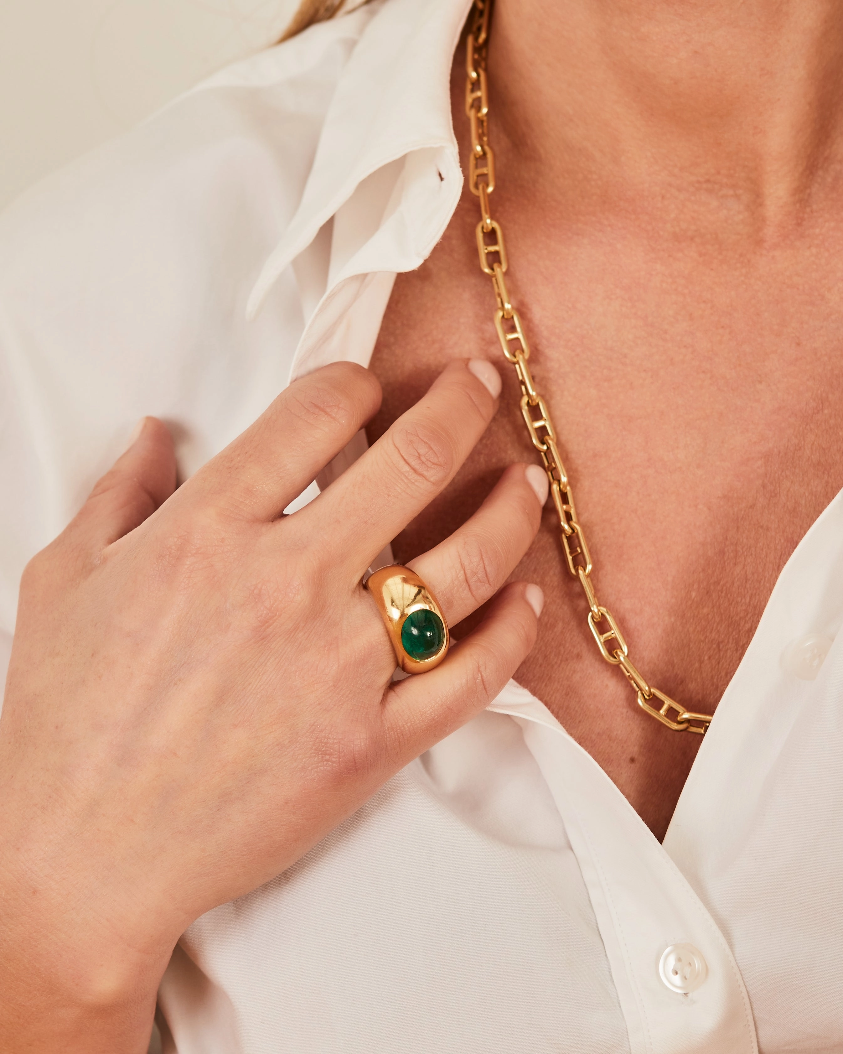 Yellow gold ring with a cabochon cut tsavorite garnet
