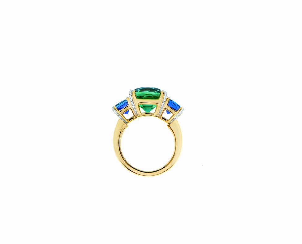 Yellow gold ring with a green tourmaline and tanzanites
