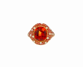 Yellow gold ring with a spessartite, diamonds and sapphires