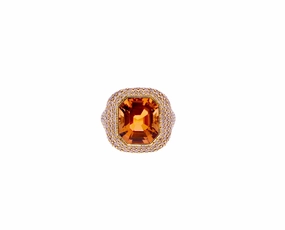 Yellow gold ring with a tourmaline and brown diamonds