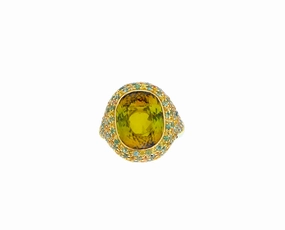 Yellow gold ring with a yellow tourmaline and sapphires