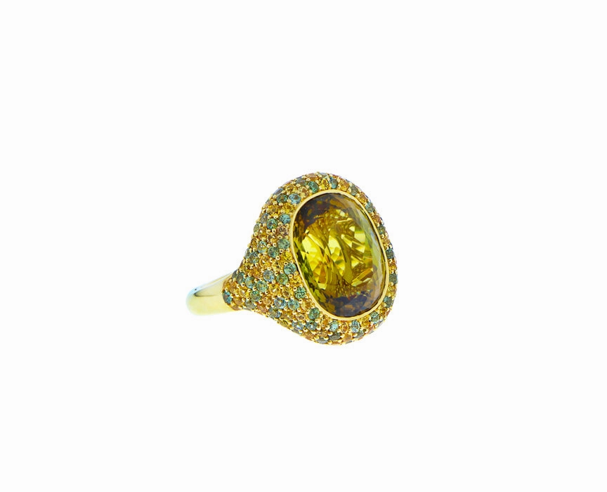 Yellow gold ring with a yellow tourmaline and sapphires