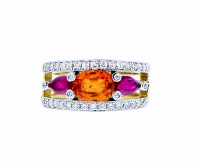Yellow gold ring with diamonds , an oval spessartite and ruby