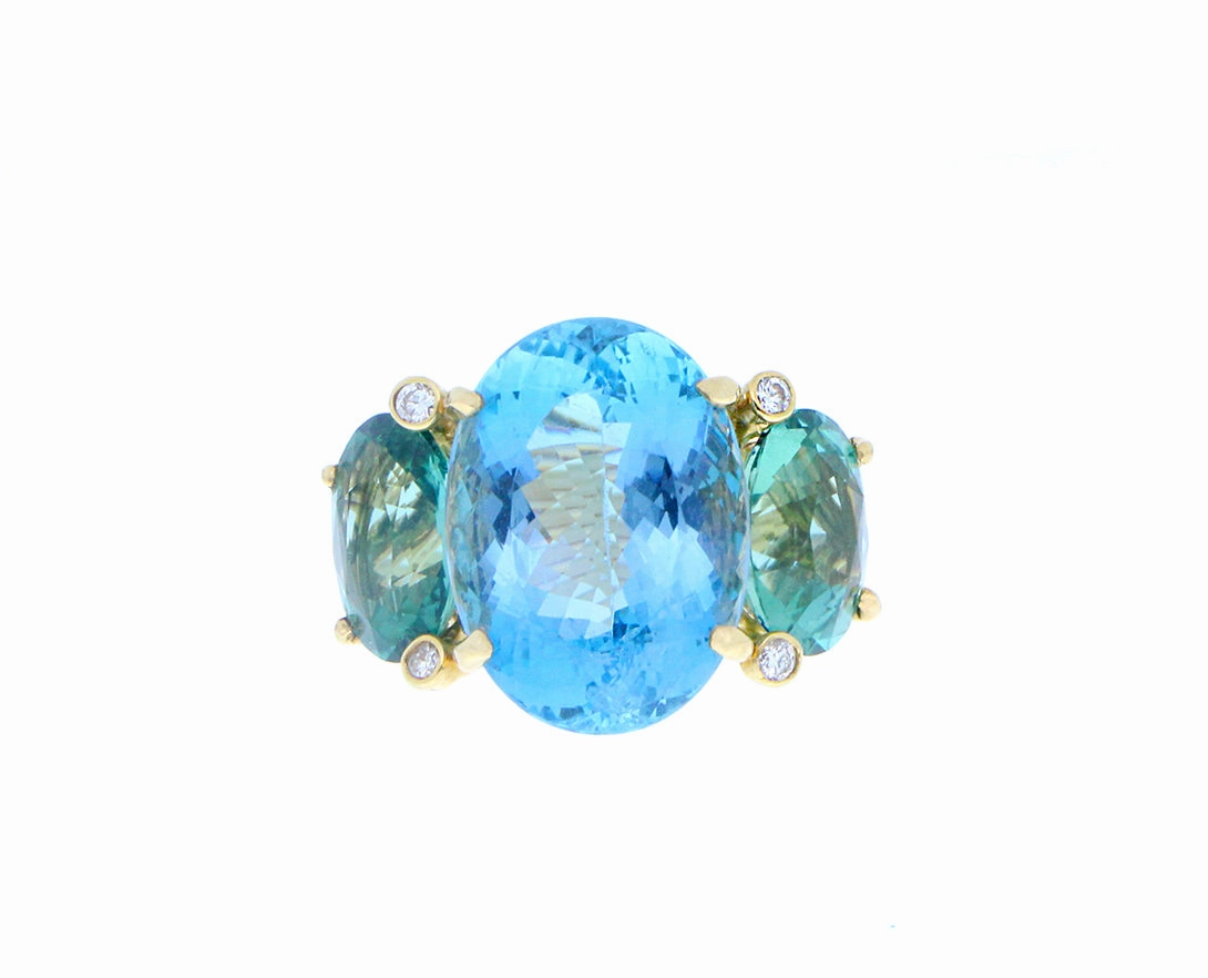 Yellow gold ring with diamonds, aquamarine and two green tourmalines
