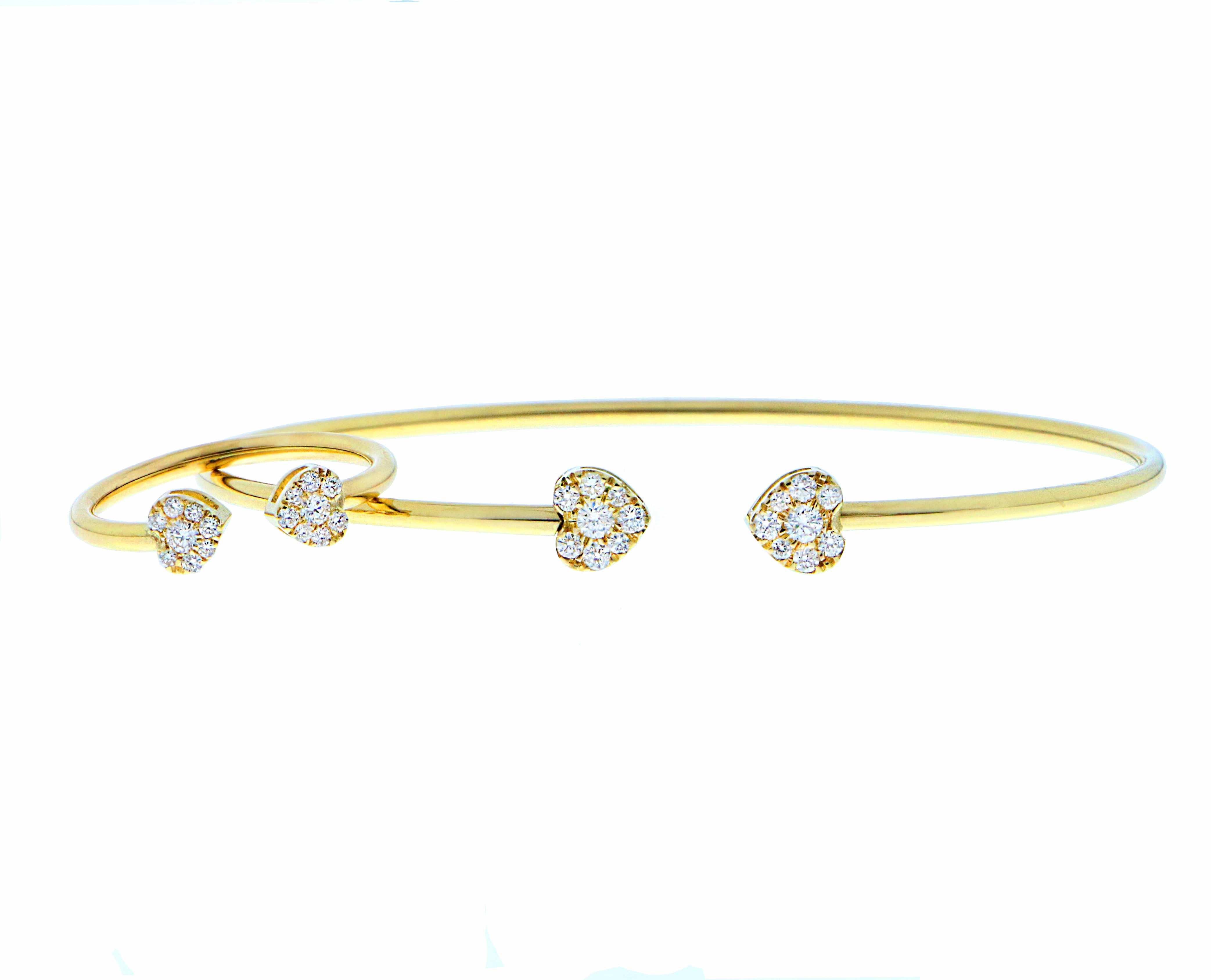 Yellow gold ring with two diamond hearts