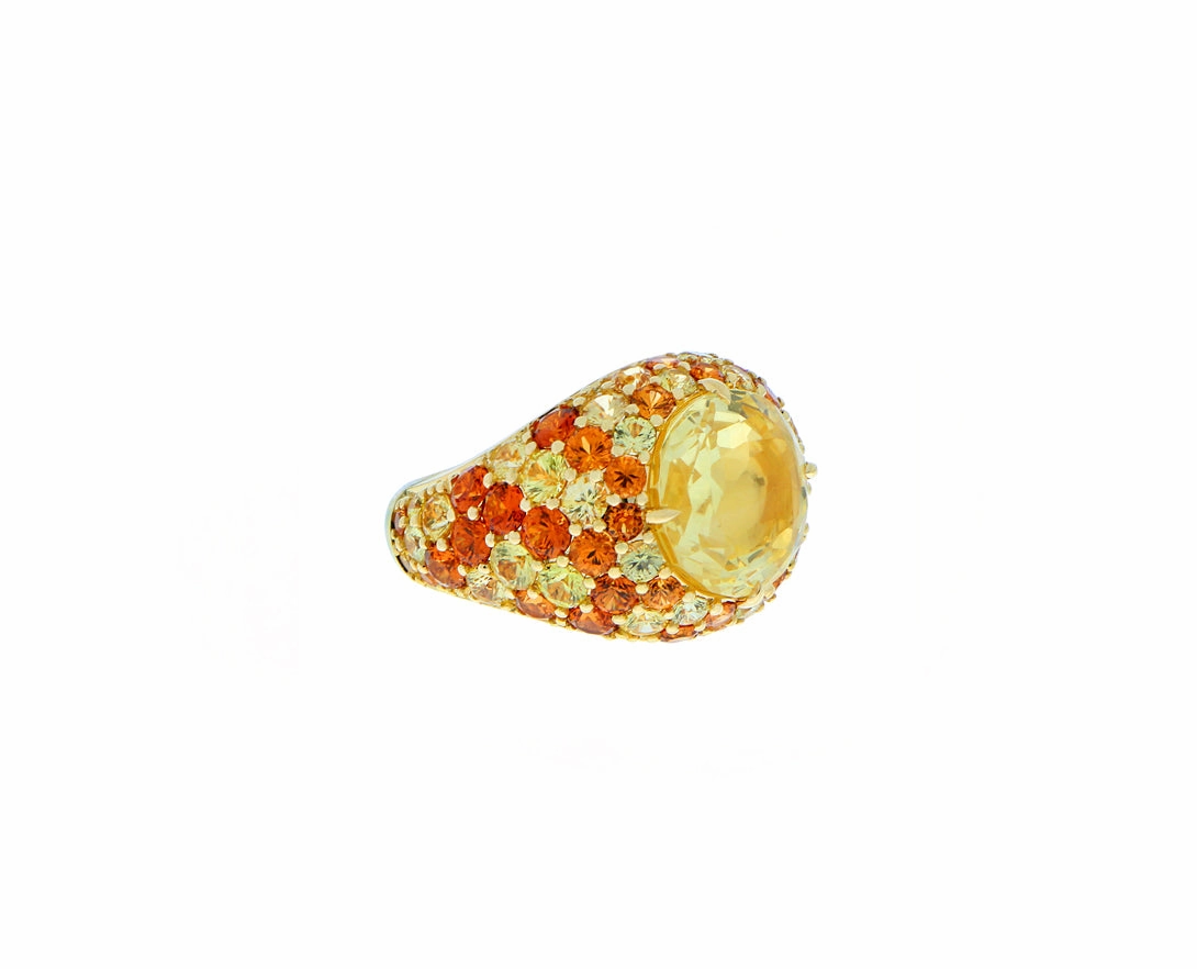 Yellow gold ring with yellow sapphire, spessartite garnets