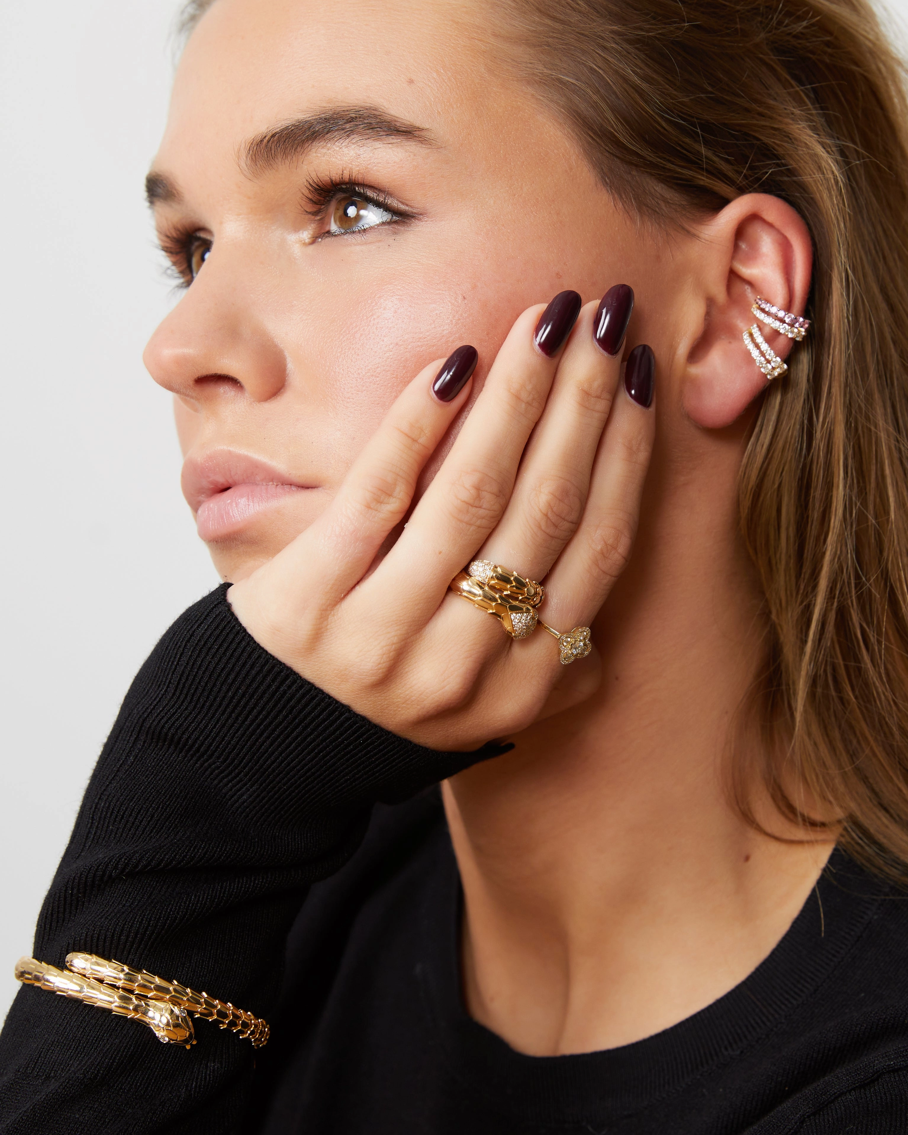 Yellow gold rings with a diamond peridot or topaz clover charm