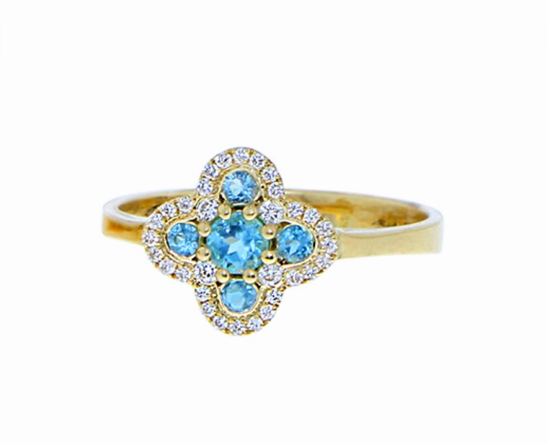Yellow gold rings with a diamond peridot or topaz clover charm