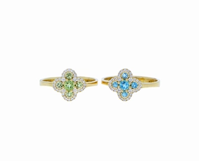Yellow gold rings with a diamond peridot or topaz clover charm