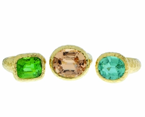Yellow gold rings with peridot and tourmaline