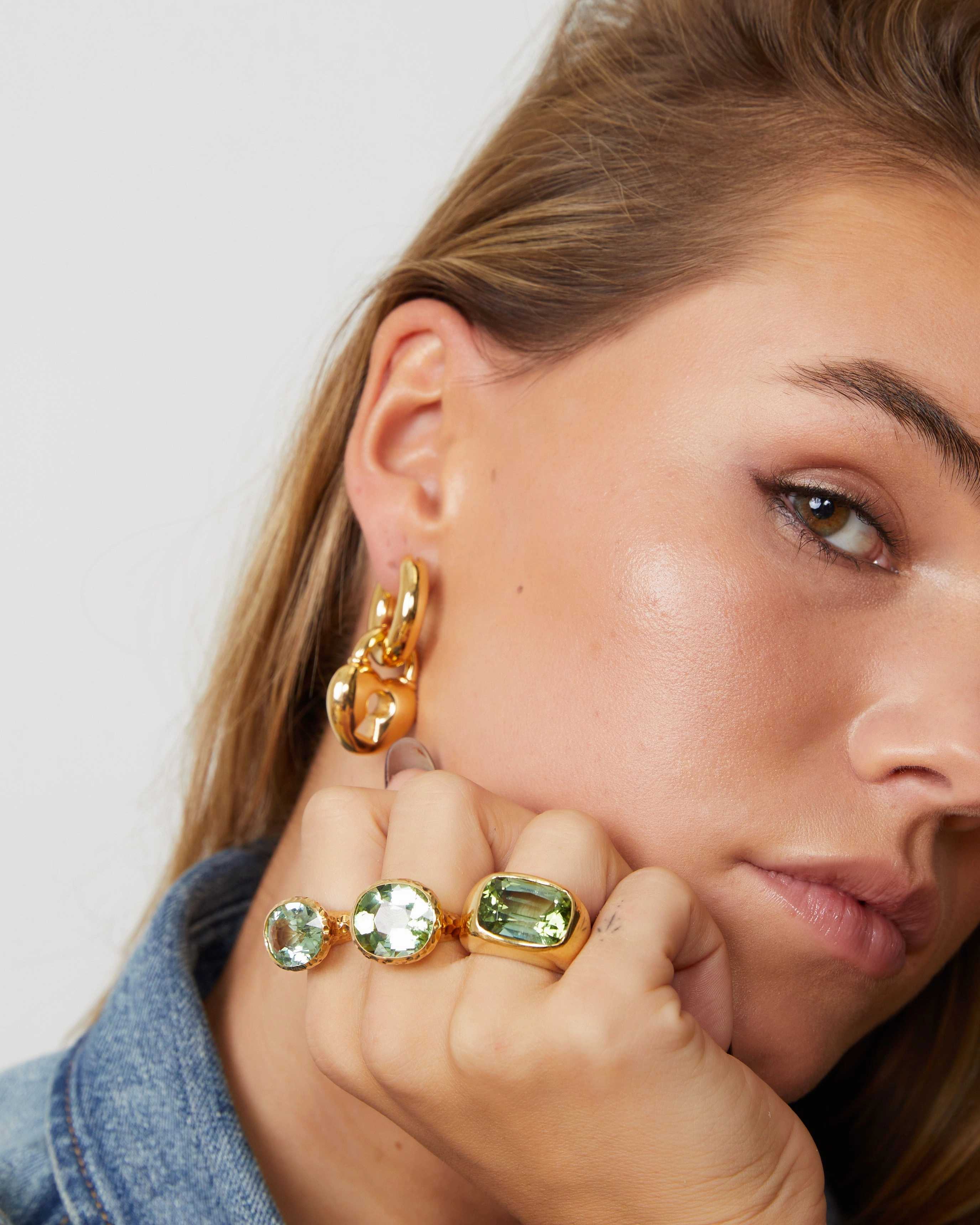 Yellow gold rings with peridot and tourmaline