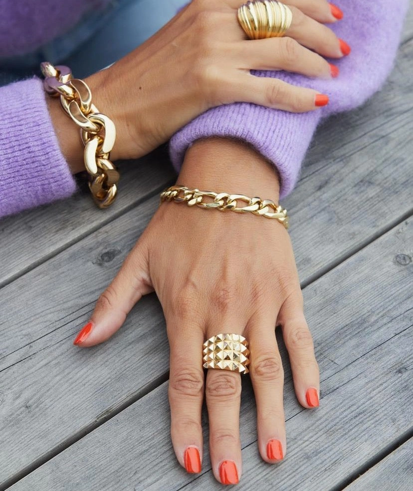 Yellow or rose gold ring with four rows of studs